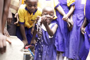 Girl splashing water
