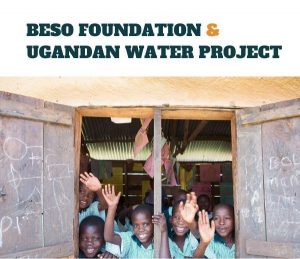 Ugandan children waving from schoolhouse window